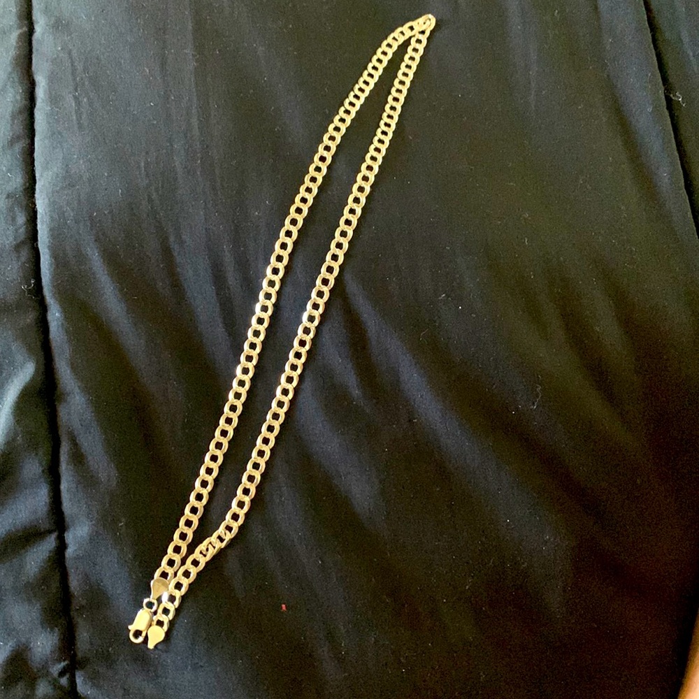 12” gold Cuban link chain. I never take it off but hey old to me new to you?